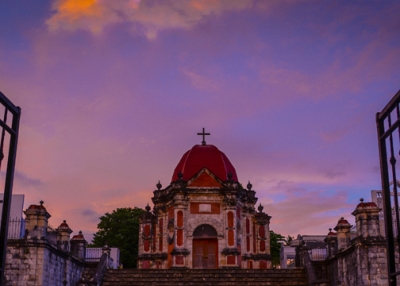 A vibrant purple sky cloaks Campo Santo de San Joaquin, an old cemetery, in Iloilo, Philippines on November 02, 2013. (Eduardo S. Seastres)