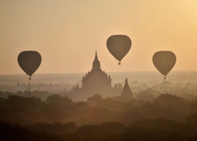 Hot air balloons fly over ancient temples in Bagan, Myanmar, at sunrise on November 25, 2014. (Phyo Hein Kyaw/AFP/Getty Images)