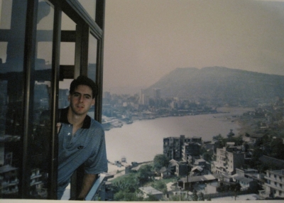 Peter Hessler in his apartment in Fuling, China, in the fall of 1996 shortly after he arrived. His apartment looked down to the Wu River and then the Yangtze in the distance. The main city of Fuling is visible to the left, at the juncture of the rivers.