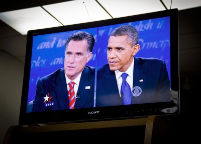 Governor Mitt Romney (L) and U.S. President Barack Obama (R) squaring off in the third 2012 U.S. Presidential debate, as seen at a debate viewing party in Covina, Virginia on Oct. 22, 2012. (Neon Tommy/Flickr)