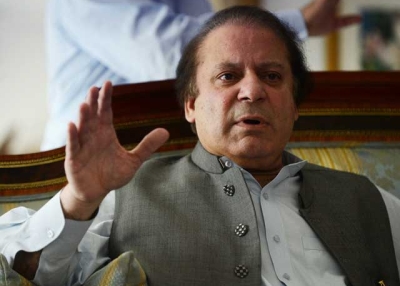 Pakistan's incoming prime minister Nawaz Sharif speaks to journalists at his farm house in Raiwind, on the outskirts of Lahore, on May 13, 2013. (Roberto Schmidt/AFP/Getty Images) 