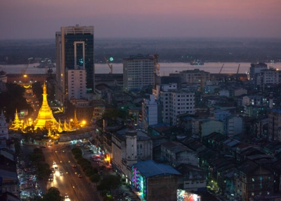 Rush hour traffic moves near by the Sule Pagoda at dusk December 14, 2011 in Yangon, Myanmar. (Paula Bronstein/Getty Images) 