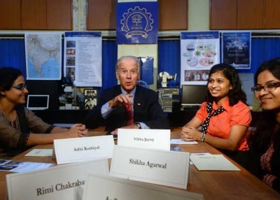 U.S. Vice President Joe Biden (C) interacts with students during a visit to the Indian Institute of Technology (IIT) in Mumbai on July 25, 2013. (Indranil Mukherjee/AFP/Getty Images) 