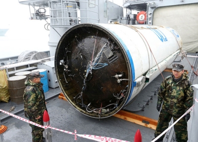 The wreckage of a North Korean rocket is seen at the Second Fleet Command's naval base on December 14, 2012 in Pyeongtaek, South Korea. The debris is the first stage of a long range rocket that launched on December 12, 2012. (Yeong-Wook/DongA Daily/Getty)