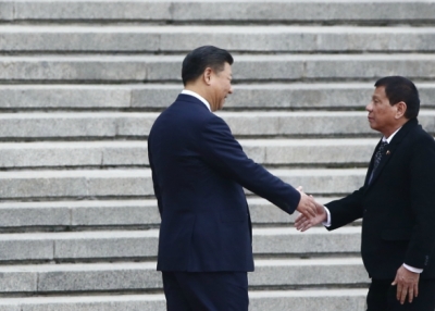 President of the Philippines Rodrigo Duterte and Chinese President Xi Jinping shake hands as they attend a welcoming ceremony at the Great Hall of the People on October 20, 2016 in Beijing, China. (Thomas Peter/Pool-Getty Images)