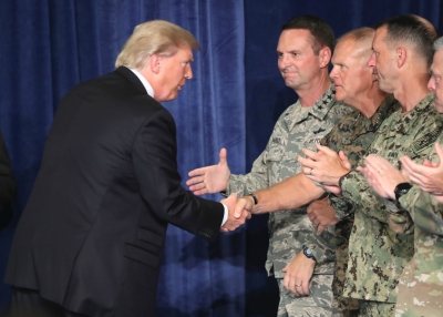 U.S. President Donald Trump greets military leaders before his speech on Afghanistan at the Fort Myer military base on August 21, 2017 in Arlington, Virginia. (Mark Wilson/Getty Images)