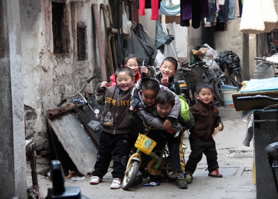 Children horsing around during their day off from school in Shanghai on March 10, 2012. (jijis/Flickr)