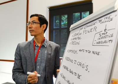 Natharoun Ngo, of Cambodia, leads a session at the 2015 Asia 21 Young Leaders Summit in Hong Kong.