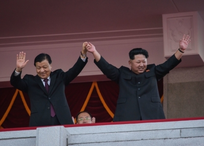 North Korea's leader Kim Jong-Un and Chinese Politburo standing committee member Liu Yunshan