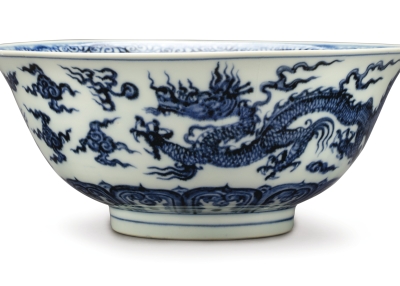 A RARE ANHUA-DECORATED BLUE AND WHITE ‘DRAGON’ BOWL