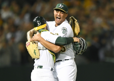 Sean Manaea celebrates after throwing a no-hitter against the Boston Red Sox.