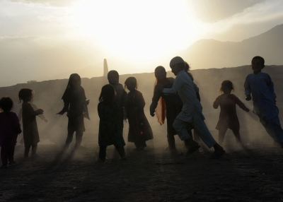 Afghan children play on the outskirts of Jalalabad
