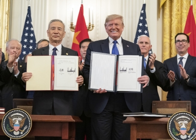President Donald J. Trump and Chinese Vice Premier Liu He sign the U.S.-China Phase One Trade Agreement