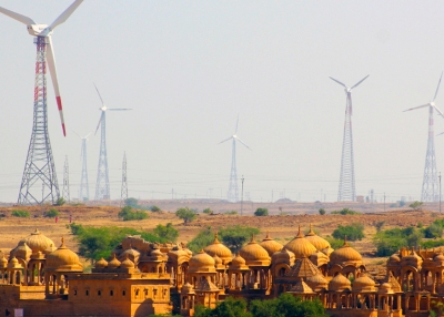 Kohli & Suckling - A_Wind_Energy_farm_and_the_Cenotaphs_Jaisalmer_Rajasthan_India - Wikimedia