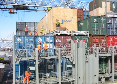 Workers on a container ship in Rotterdam