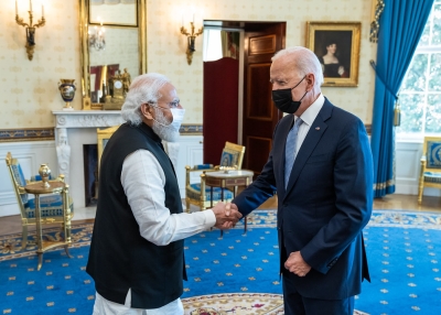 President Joe Biden greets India Prime Minister Narendra Modi, Friday, September 24, 2021, in the Blue Room of the White House.