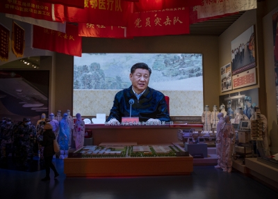 Chinese President Xi Jinping is seen in a video in the section of the museum dedicated to the war against Covid 19 at the Museum of the Communist Party of China on December 16, 2021 in Beijing, China.