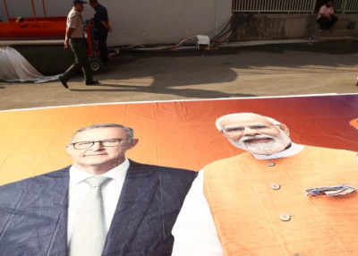  Posters being prepared in Ahmedabad for the meeting between the Indian and Australian prime ministers.  Getty