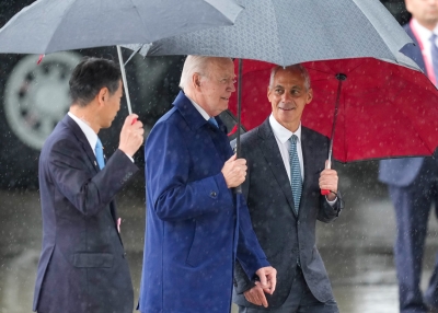 Ambassador Emanuel (left) walks with Japanese Prime Minister Kishida (center) and commanding officer Captain Daryle Cardone (right), during a tour of the USS Ronald Reagan aircraft carrier on November 6, 2022. 