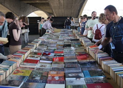 People browse at the Southbank book market in London.