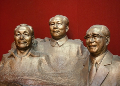 A statue displaying, from left, Deng Xiaoping, Mao Zedong, and Jiang Zemin, photographed in Beijing, China on August 9, 2010. (Mills Baker/Flickr) 