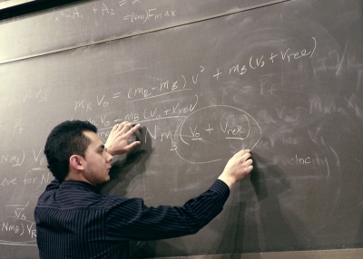 Professor at chalkboard. Gianpierre Soto/Flickr