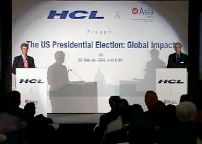 Richard Burt and Nelson Cunningham, the campaign advisers for the US presidential elections, debate in Mumbai.  