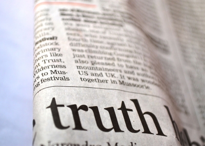 The word "truth" in a newspaper