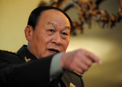 Chinese Defense Minister Liang Guanglie gestures during a courtesy visit to Philippine President Benigno Aquino (unseen) at the Malacanang Palace in Manila on May 23, 2011. Aquino said he hoped his talks with Liang would help to avoid a real conflict over the chain of islands in the South China Sea which both countries claim. (Noel Celis/AFP/Getty Images)