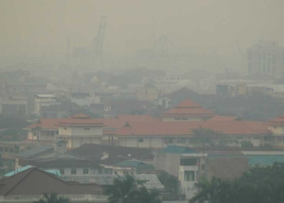 In a picture taken on September 9, 2009 haze covers Pontianak city in Kalimantan on Indonesia's Borneo island. The number of haze-causing spot fires on Indonesia's half of Borneo island have more than doubled, sending pollution into Malaysia, officials said on September 29, 2009. (AFP/AFP/Getty Images)