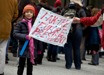 A girl at an immigration rally in Daley Plaza in Chicago (Joseph Mietus/Flickr)