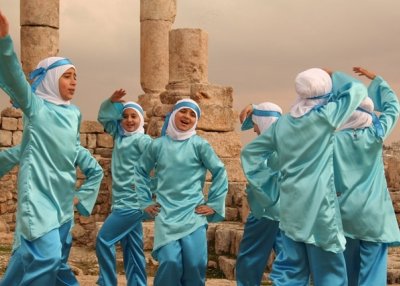 A group of girls dance to celebrate the birth of the prophet Mohammed in Citadeel, Amman, Jordan.  (hazy_jenius/flickr)