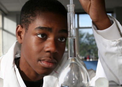 Student doing chemistry experiment. (mrloz/istockphoto)
