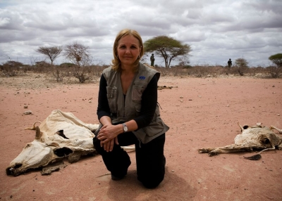 Josette Sheeran during an interview near carcasses of animals that died because of drought in Wajir, northeastern Kenya, on July 23, 2011. (WFP/Siegfried Modola)