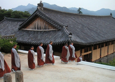 Monks going down to their rooms after evening worship at Haeinsa.