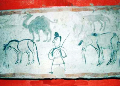 Old tomb painting showing a merchant with horses and camels along the Silk Roads. Luotoucheng, Gansu Province, China; circa 221-317 C.E. Courtesy Gaotai County Museum.