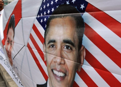 A man holds a banner depicting US President Barack Obama during a pro-Obama rally in Jakarta on March 19, 2010. (Adek Berry/AFP/Getty Images) 