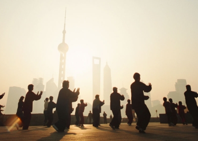 Residents practicing T'ai chi at dawn in Shanghai, China. (Kevin Phillips/Getty Images)