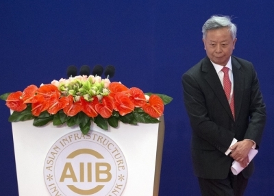 Jin Liqun, the first president of the Asian Infrastructure Investment Bank (AIIB), leaves the podium during the opening ceremony of the AIIB in Beijing on January 16, 2016. (MARK SCHIEFELBEIN/AFP/Getty Images)
