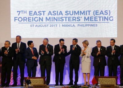 Foreign Ministers applaud after a group photo at the start of the 7th East Asia Summit Foreign Ministers' Meeting as part of the 50th ASEAN regional security forum in Manila on August 7, 2017 (Aaron Favila/AFP/Getty Images)
