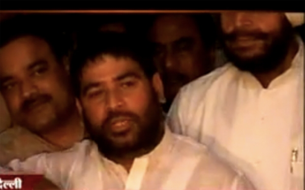 In this screen grab from YouTube, Indian politician Sadhu Yadav speaks at a press conference in Bihar. 