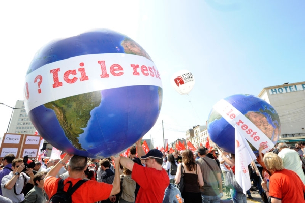 Anti-G8 activists hold globes reading 'Hello G20? This is the rest of the world' as they take part in a demonstration, on May 21, 2011 in Le Havre, northwestern France, to denounce last week's G8 summit in Deauville, France. (Damien Meyer/AFP/Getty Images)