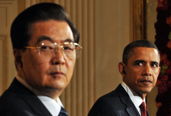 U.S. President Barack Obama (R) looks on as his Chinese counterpart Hu Jintao answers a question during a press conference in the East Room at the White House in Washington, DC, on January 19, 2011. (Mandel Ngan/AFP/Getty Images)