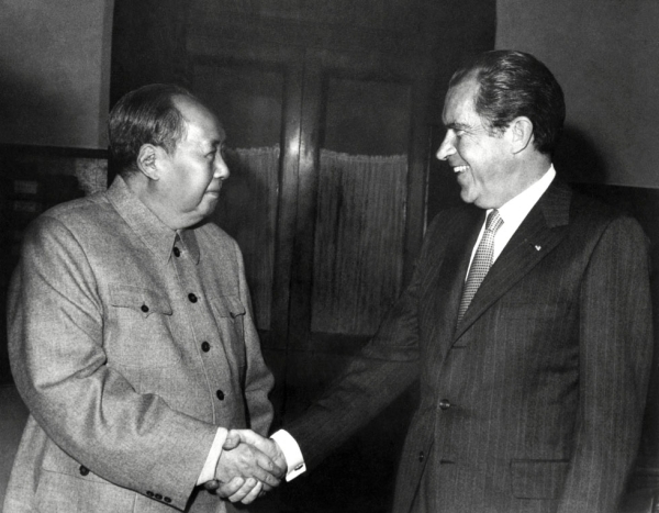 Chinese President Mao Zedong shake hands with Richard Nixon after their meeting in Beijing, China on February 22, 1972 during Nixon's official visit to China. (AFP/Getty Images)