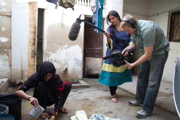 Sharmeen Obaid Chinoy (C) filming 'Saving Face' in the south of Punjab, Pakistan. (Sharmeen Obaid Films)