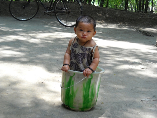 Kid in a bucket: A child in Rowmari, Assam photographed by a relative. (Somaina Basumatary)
