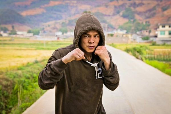 Qi Moxiang, featured in the new documentary China Heavyweight, shadowboxing in rural Sichuan. (EyeSteelFilm)