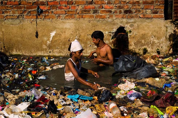The rag-pickers of Mumbai collect tons of garbage each day, but they are not recognized by the city as a work force. (Jonathan Raa)