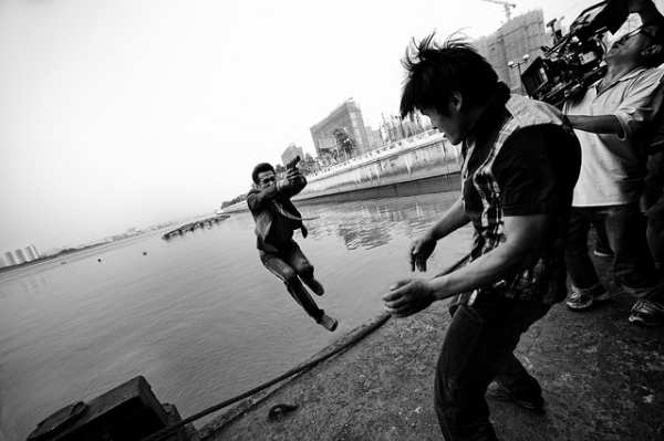 A film crew captures a climactic action scene on the harbor in Guangzhou, Guangdong, China on June 14, 2012. (Jonathan Kos-Read/Flickr)