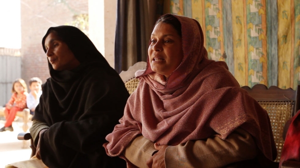 Poet and educator Rani Shameem Akhtar (R) leads a women's rights workshop in Malival, Punjab. (Andreas Burgess) 